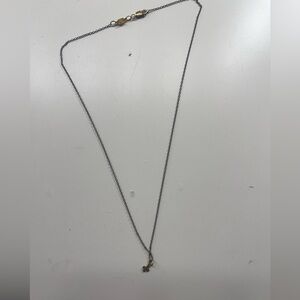 E Newton gold cross necklace